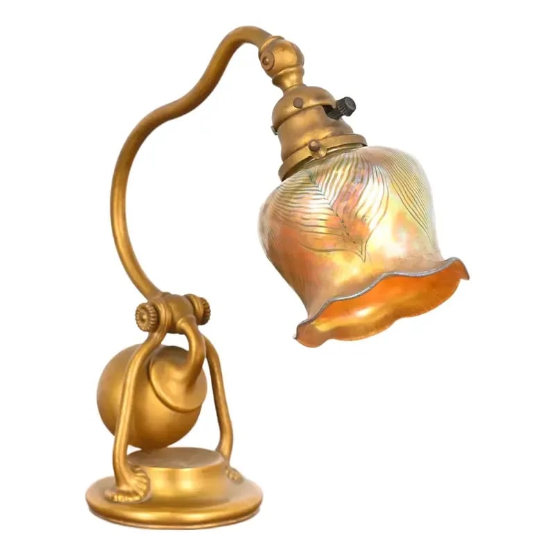 Tiffany Studios New York Bronze Doré Counterbalance Desk Lamp With Favrile Glass Pulled Feather: A gorgeous Arts & Crafts or Art Deco period bronze counterbalance desk lamp or table lamp By Tiffany Studios (signed to the underside of base) New York, USA, Early 20th Century Gilt bronze base, with 