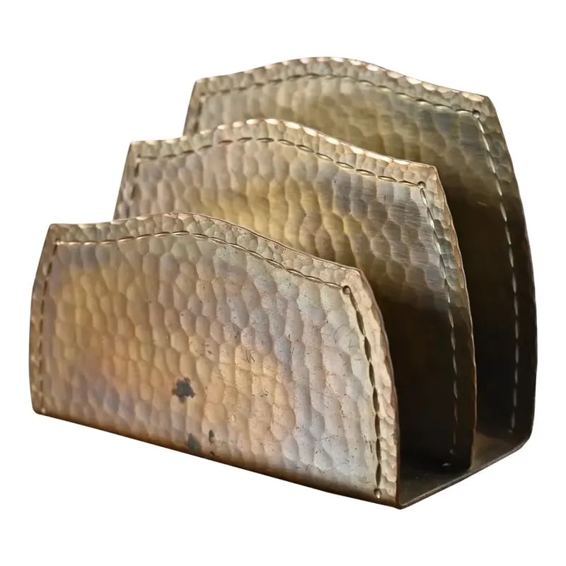 Roycroft Arts & Crafts Hammered Brass Over Copper Letter Rack: A gorgeous Arts & Crafts period brass finished hand hammered copper letter rack By Roycroft (signed with impressed orb and cross mark) USA, Early 20th Century Measures: 4.75"W x 2.5"D x 3.75"H. Good o