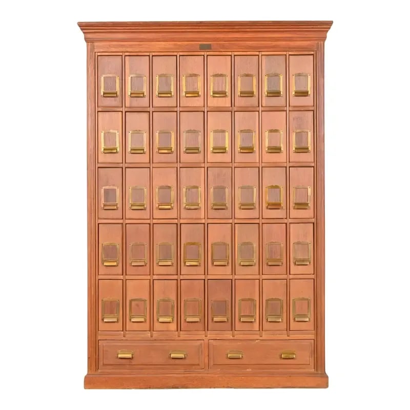 Antique Arts & Crafts Oak 42-Drawer Card File Cabinet, Circa 1900: A rare antique Arts & Crafts card file cabinet By Clarke & Baker Co. USA, Circa 1900 Solid oak, with original brass hardware. Measures: 51.25"W x 14"D x 74"H. Very good original vintage condition. See