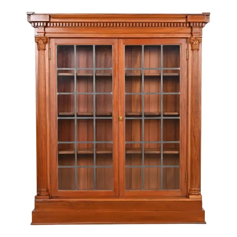 R. J. Horner Style Antique American Empire Carved Mahogany Bookcase Cabinet, Circa 1890s: A gorgeous American Empire, Victorian, or Neoclassical style bookcase cabinet In the manner of R.J. Horner & Co. USA, Circa 1890s Carved mahogany, with mullioned leaded glass front doors, and original