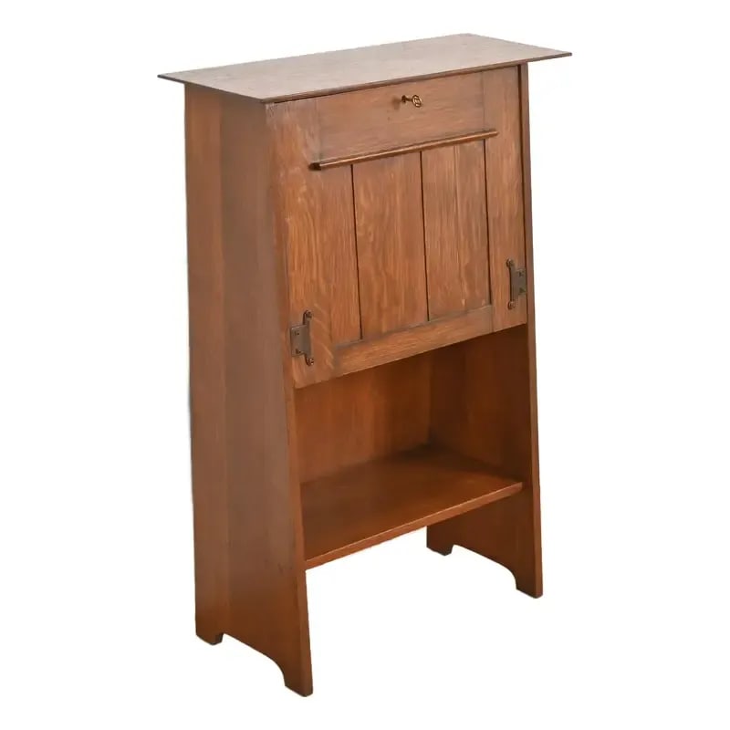 Gustav Stickley Antique Mission Oak Arts & Crafts Drop Front Secretary Desk, Circa 1900: A rare and exceptional Mission or Arts & Crafts drop front secretary desk By Gustav Stickley (signed with paper label) USA, Circa 1900 Quarter sawn oak, with original hammered copper hardware. Measure