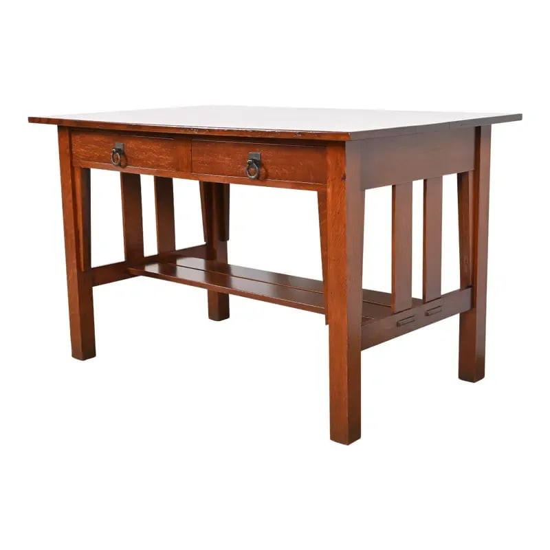 Antique Stickley Brothers Mission Oak Arts & Crafts Desk or Library Table, Newly Restored: An exceptional antique Mission or Arts & Crafts writing desk or library table By Stickley Brothers USA, Circa 1900 Quarter sawn oak, with original hammered copper hardware. Measures: 48"W x 30"D x 30"
