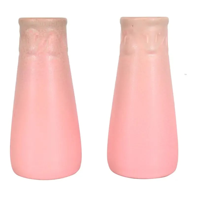 Rookwood Pottery Arts & Crafts Glazed Ceramic Vases, 1930: A gorgeous pair of Arts & Crafts period glazed art pottery vases By Rookwood Pottery USA, 1930 Glazed ceramic in a beautiful light pink color with light green accents at rim. Measures: 3"W x 3"D x 6.2