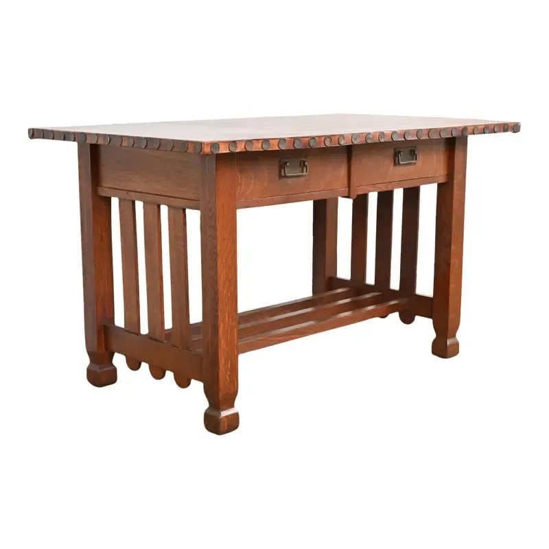 Antique Stickley Brothers Mission Oak Arts & Crafts Leather Top Writing Desk or Library Table: A rare and exceptional antique Mission oak Arts & Crafts writing desk or library table By Stickley Brothers USA, Circa 1900 Solid quarter sawn oak, with original leather top, and hammered copper hardw