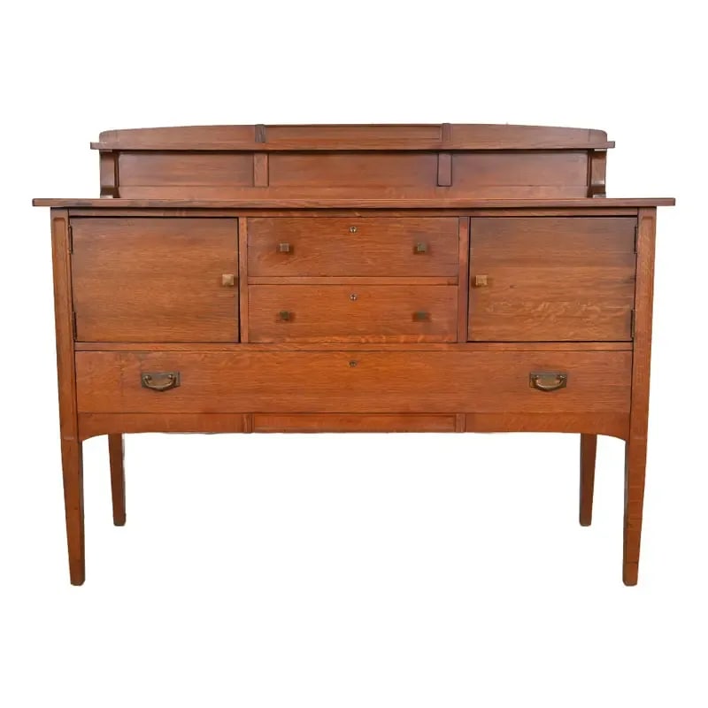 Limbert Antique Mission Oak Arts & Crafts Sideboard Buffet or Bar Cabinet, Circa 1900: An exceptional Mission or Arts & Crafts sideboard, credenza, buffet server, or bar cabinet By Charles P. Limbert Co. USA, Circa 1900 Quartersawn oak, with original hammered copper hardware. Measures: 