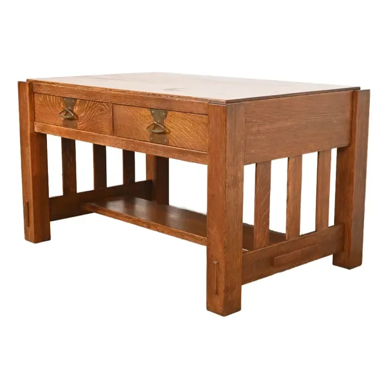 Imperial Furniture Grand Rapids Mission Oak Arts & Crafts Writing Desk or Library Table, Circa 1910: An exceptional antique Mission or Arts & Crafts writing desk or library table In the manner of Stickley Brothers By Imperial Furniture Co. USA, Circa 1910 Solid quarter sawn oak, with original copper 