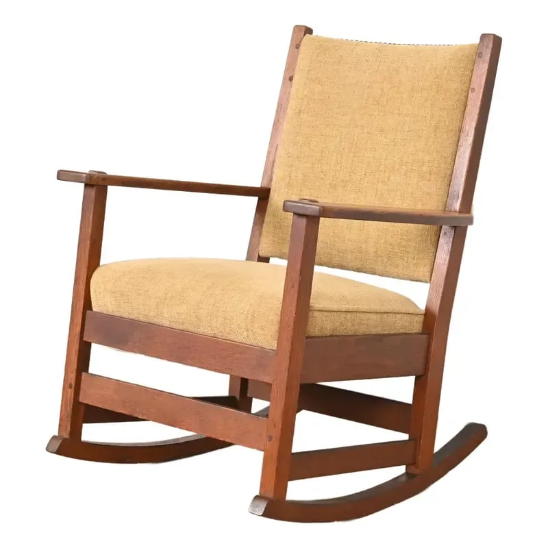 L. & J. G. Stickley Antique Mission Oak Arts & Crafts Rocking Chair, Circa 1900: An exceptional antique Mission or Arts & Crafts period rocking chair By L. & J.G. Stickley USA, Circa 1900 Solid quarter sawn oak frame, with upholstered seat and back cushions. Measures: 25.75"W x 27
