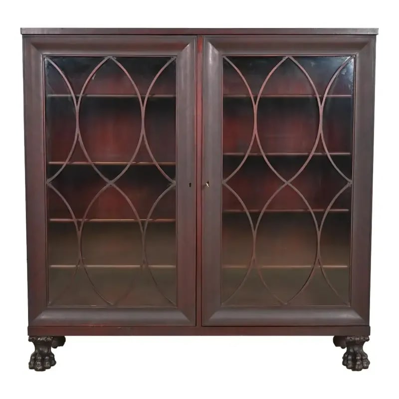 George C. Flint Co. Antique American Empire Carved Mahogany Double Bookcase With Lion's Paw Feet,: An outstanding antique American Empire or Victorian double bookcase cabinet By George C. Flint Co. USA, Circa 1890s Mahogany, with lion paw feet, and mullioned glass front doors. Shelves are adjustabl