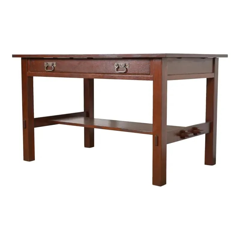 Antique Stickley Mission Oak Arts & Crafts Writing Desk or Library Table, Circa 1900: A rare and exceptional antique Mission or Arts & Crafts writing desk or library table By Charles Stickley USA, Circa 1900 Solid quarter sawn oak, with original hammered copper hardware. Measures: 48"W