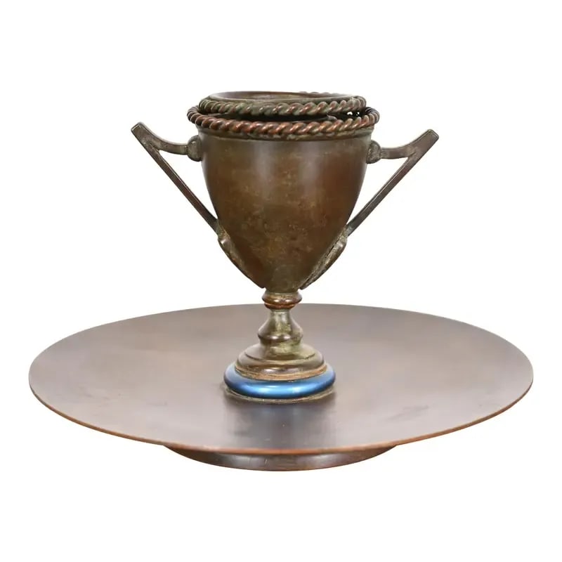 Louis Comfort Tiffany Furnaces Bronze and Favrile Glass Candlestick, 1920s: A gorgeous Art Deco or Arts & Crafts period bronze and blue favrile glass candlestick holder in the form of an urn By Louis Comfort Tiffany Furnaces, Inc. New York, USA, Early 20th Century Measures: 6