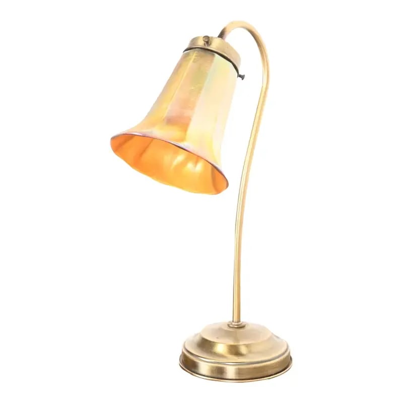 Art Deco Brass Desk Lamp With Quezal Favrile Art Glass Shade: A gorgeous vintage Art Deco or Art Nouveau desk lamp or table lamp In the manner of Tiffany Studios USA, 20th Century Brass base, with beautiful Favrile art glass shade signed Quezal. Measures: 5.25"W