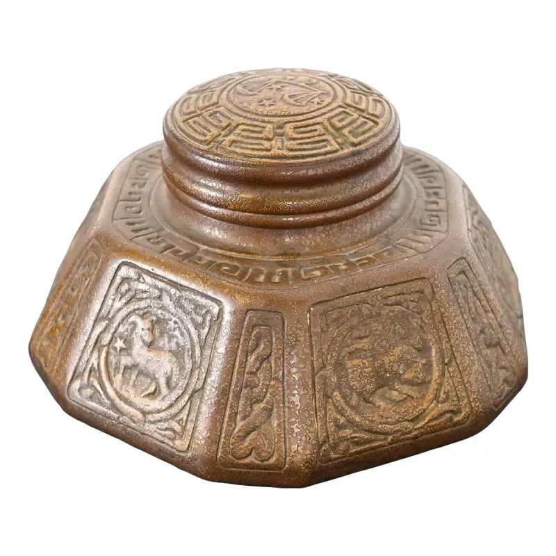 Tiffany Studios New York Zodiac Bronze Large Inkwell: A gorgeous Arts & Crafts period "Zodiac" pattern bronze inkwell By Tiffany Studios (signed to the underside) New York, USA, Early 20th Century Measures: 6.75"W x 6.75"D x 4"H. Good original vintage co