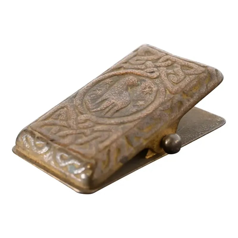 Tiffany Studios New York Zodiac Pattern Bronze Paper Clip: A gorgeous antique Arts & Crafts or Art Deco period bronze "Zodiac" pattern paper clip By Tiffany Studios (signed to the underside) New York, USA, Early 20th Century Measures: 2.25"W x 3.75"D x 1.25"H