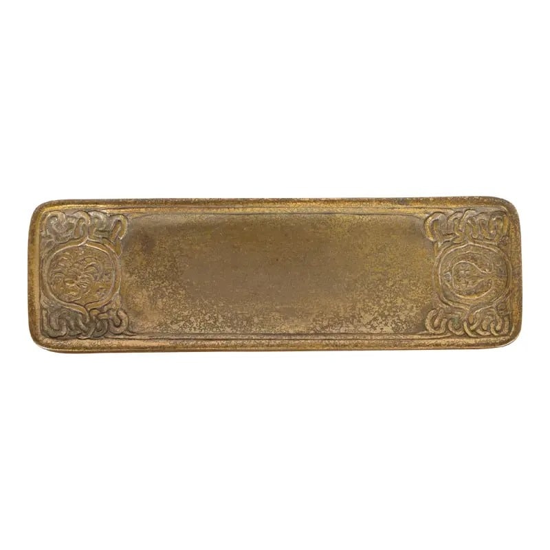 Tiffany Studios New York Zodiac Bronze Doré Pen Tray: A gorgeous antique gilt bronze desk pen tray featuring Zodiac designs By Tiffany Studios (signed to the underside) New York, USA, Early 20th Century Measures: 10.13"W x 3.13"D x 0.38"H Very good origi