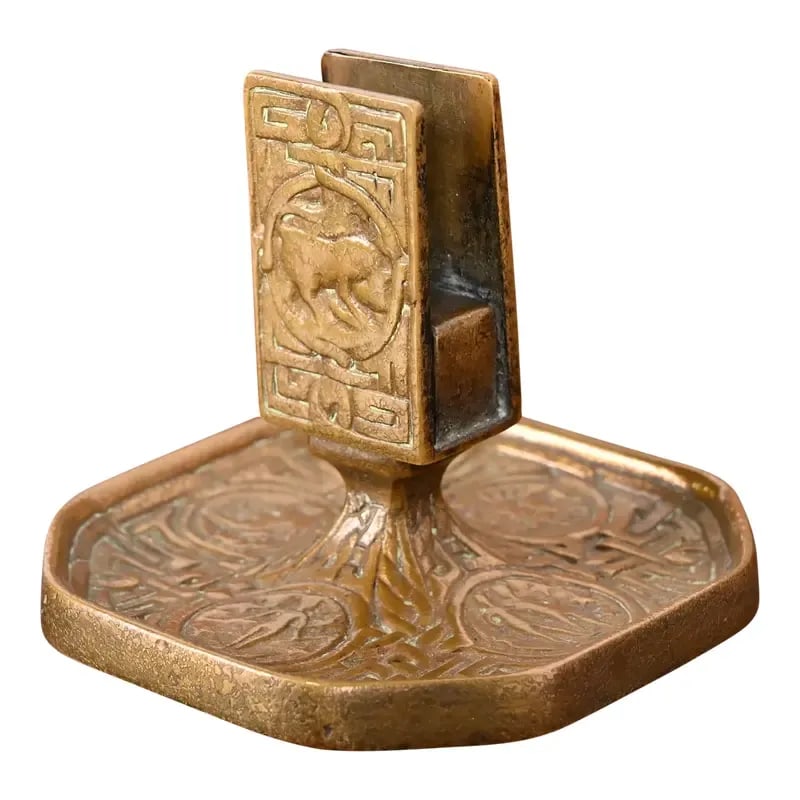 Tiffany Studios New York Zodiac Bronze Doré Match Box Holder: A gorgeous antique gilt bronze match box holder featuring symbols of the Zodiac By Tiffany Studios (signed to the underside) New York, USA, Early 20th Century Measures: 4.5"W x 4.5"D x 3.75"H. Good or