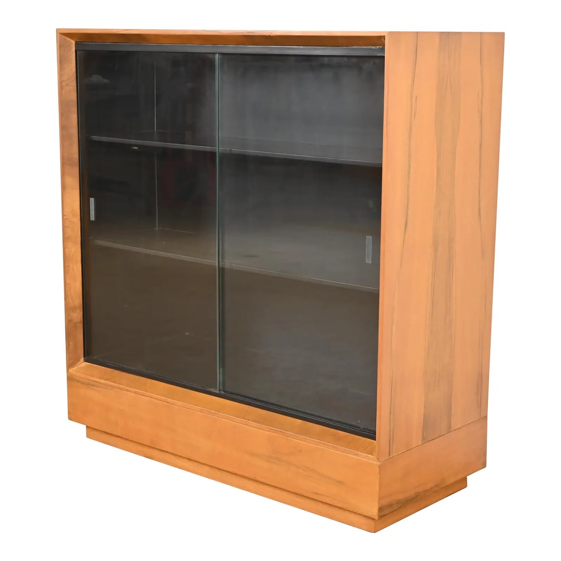 Gilbert Rohde for Herman Miller Paldao Group Bookcase, Newly Refinished: An extremely rare and exceptional Mid-Century Modern bookcase cabinet By Gilbert Rohde for Herman Miller, "Paldao Group" USA, 1940s Exotic book-matched paldao wood, with ebonized interior and glass sl