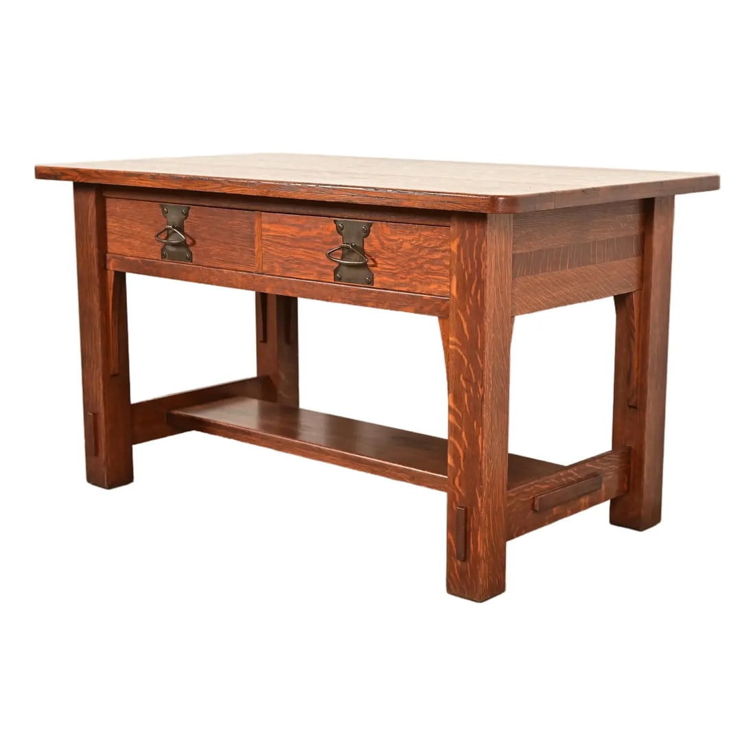 Imperial Furniture Grand Rapids Antique Mission Oak Arts & Crafts Writing Desk or Library Table: An exceptional antique Mission or Arts & Crafts writing desk or library table In the manner of Stickley Brothers By Imperial Furniture Co. USA, Circa 1910 Quarter sawn oak, with original copper hardwa