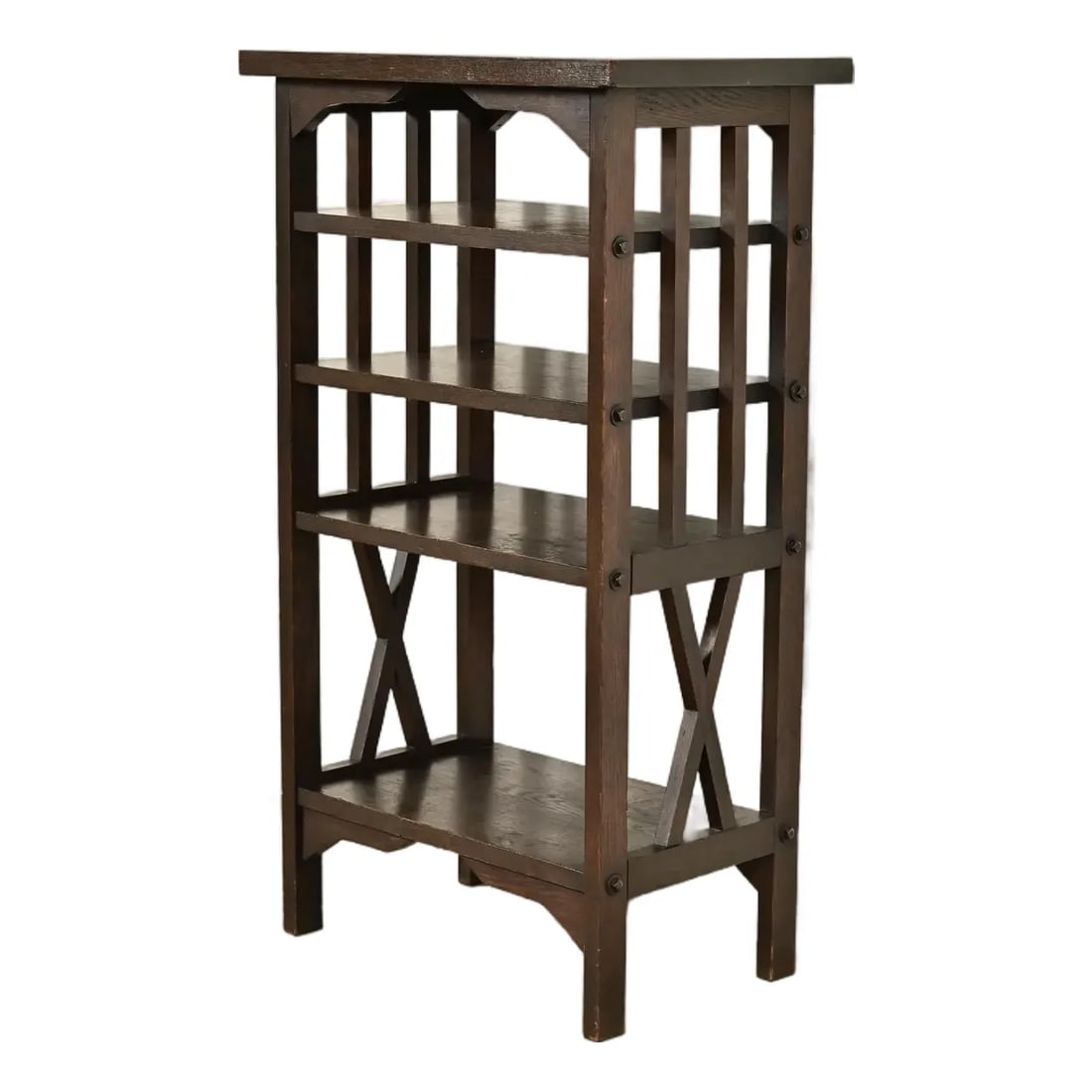 Stickley Brothers Style Antique Mission Oak Arts & Crafts Bookstand or Magazine Rack, Circa 1910: A gorgeous antique Mission or Arts & Crafts period quarter sawn oak bookcase or magazine stand In the manner of Stickley Brothers By H. T. Cushman Mfg. Co. USA, Circa 1910 Measures: 20.5"W x 13"D x 36