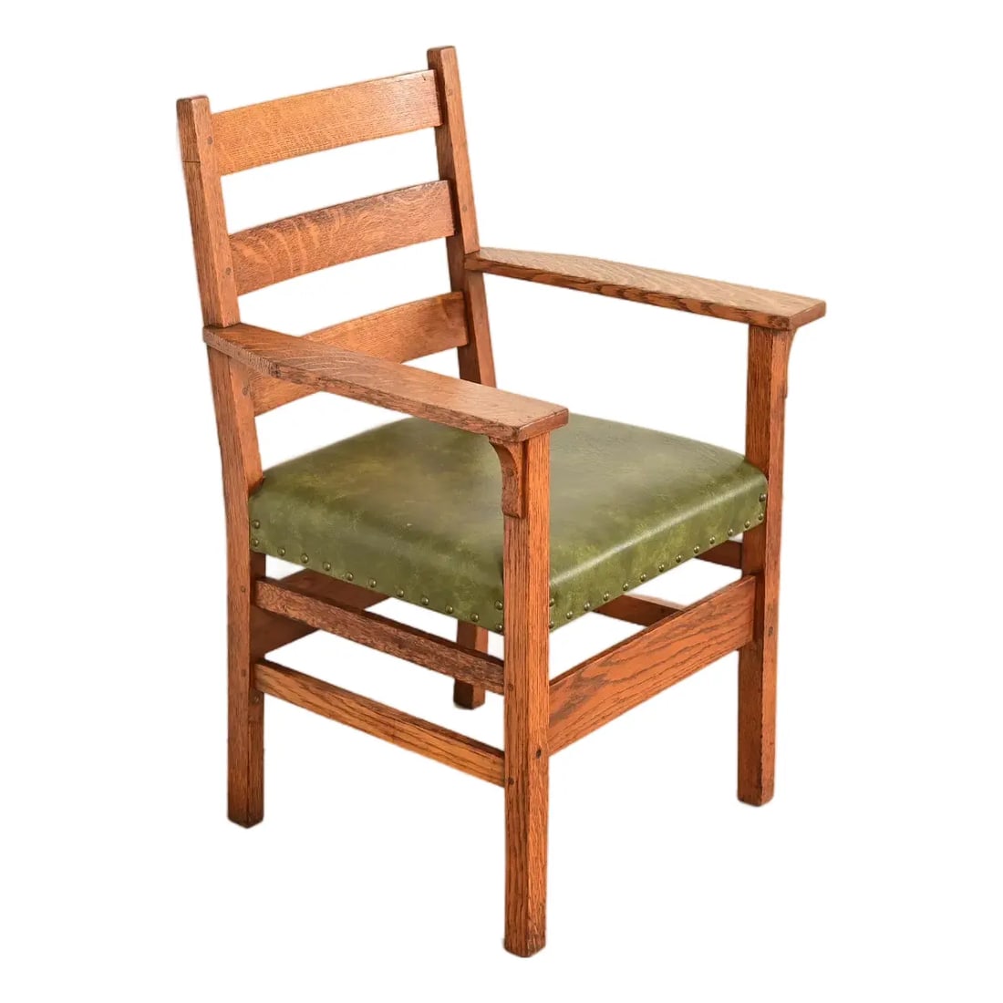 Gustav Stickley Antique Mission Oak Arts & Crafts Ladder Back Armchair, Circa 1910: A rare and exceptional antique Mission or Arts & Crafts period armchair or dining captain chair By Gustav Stickley USA, Circa 1910 Quarter sawn oak frame, with upholstered seat. Measures: 25"W x 23.25