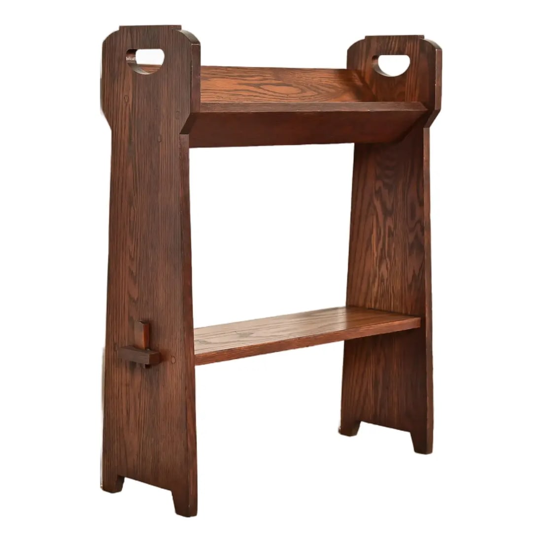 Limbert Style Antique Mission Oak Arts & Crafts Cutout Book Trough or Magazine Stand, Circa 1910: A gorgeous antique Mission or Arts & Crafts period oak bookcase, book trough, or magazine stand In the manner of Charles P. Limbert Co. USA, Circa 1910 Measures: 25.5"W x 8.5"D x 30"H. Very good origi