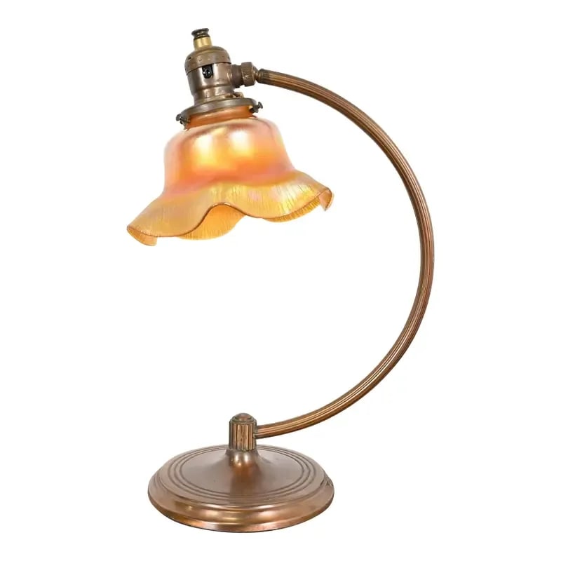 Antique Chase Art Deco Brass Desk Lamp With Quezal Favrile Art Glass Shade, Circa 1930s: A gorgeous Arts & Crafts or Art Deco period desk lamp In the manner of Tiffany Studios Base is by Chase and art glass shade is by Quezal. Both are signed. USA, Circa 1930s Brass base, with gorgeous ir