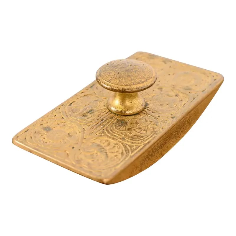 Tiffany Studios New York Zodiac Pattern Bronze Doré Rocker Blotter: A gorgeous Arts & Crafts or Art Deco period gilt bronze "Zodiac" pattern rocker ink blotter By Tiffany Studios (signed on the side) New York, USA, Early 20th Century Measures: 5.5"W x 2.75"D x 2"H. Go