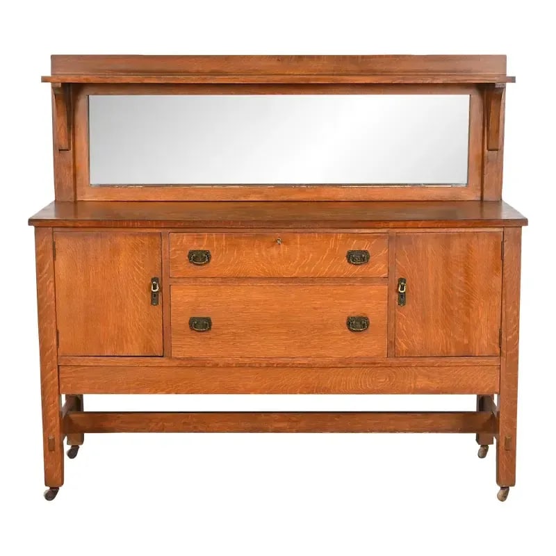 Lifetime Furniture Antique Mission Oak Arts & Crafts Sideboard or Bar Cabinet, Circa 1900: A gorgeous antique Mission or Arts & Crafts sideboard, buffet server, or bar cabinet By Lifetime Furniture USA, Circa 1900 Quarter sawn oak, with mirrored backsplash, and original hammered copper hard