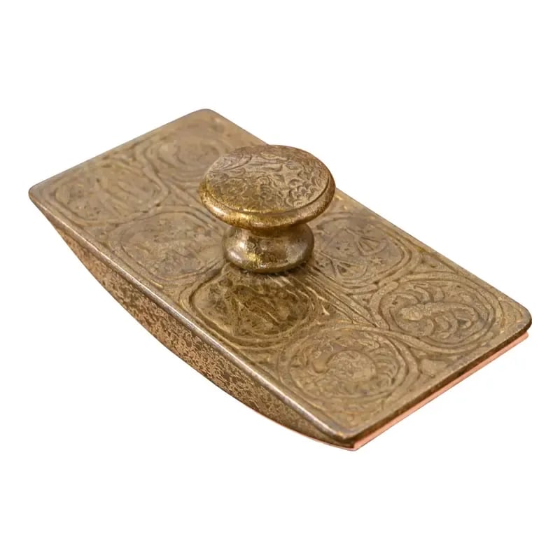 Tiffany Studios New York Zodiac Bronze Doré Rocker Blotter: A gorgeous antique gilt bronze rocker ink blotter featuring Zodiac designs By Tiffany Studios (signed on the side) New York, USA, Early 20th Century Measures: 5.5"W x 2.75"D x 2"H. Good original vinta