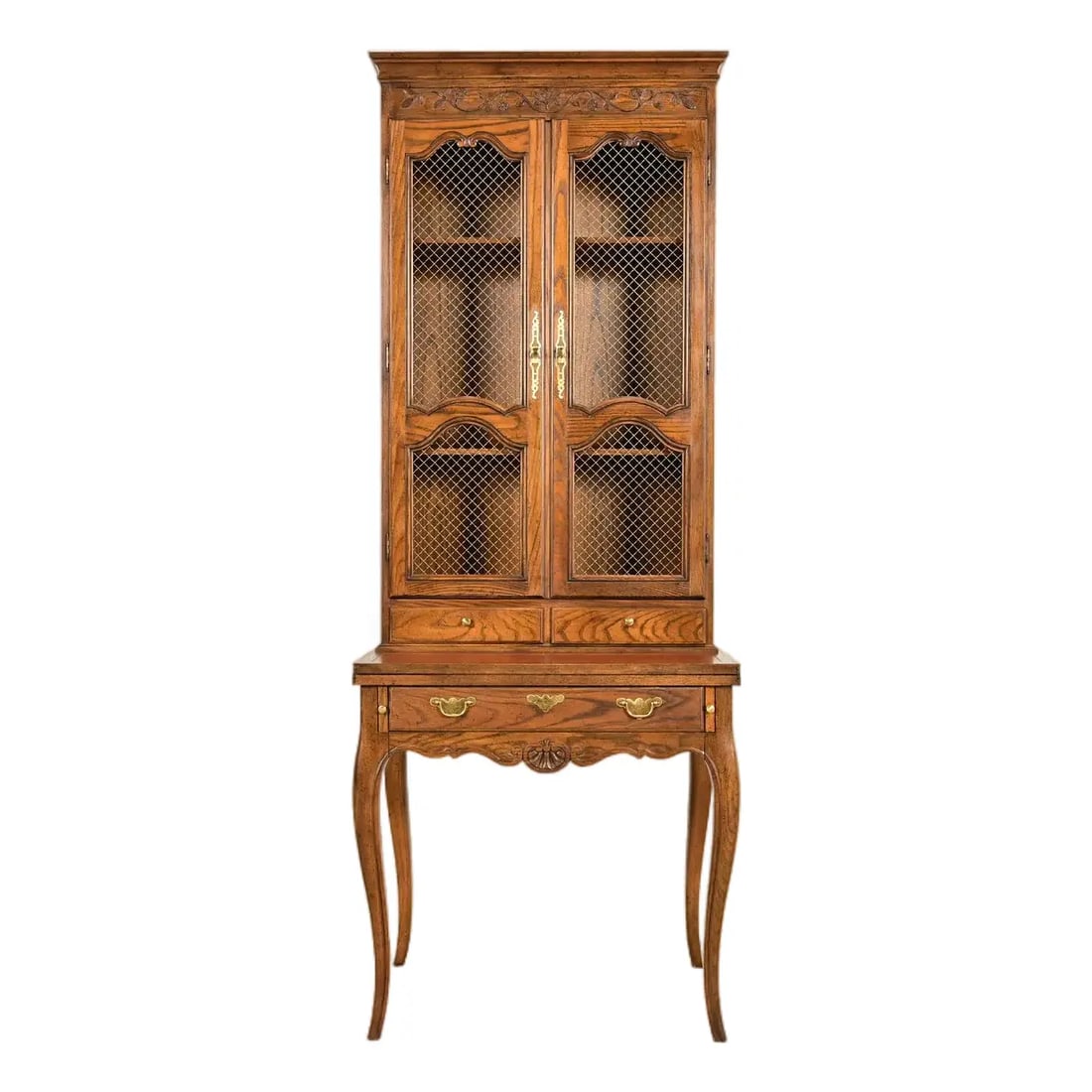 Baker Furniture French Provincial Louis XV Carved Oak Secretary Desk With Bookcase Hutch: An exceptional French Provincial Louis XV style secretary desk with bookcase hutch By Baker Furniture USA, Circa 1960s Carved oak, with leather writing surface, and original brass hardware. Interior s