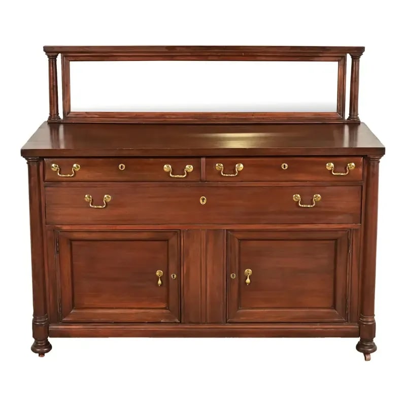 Antique American Empire Mahogany Sideboard With Mirrored Backsplash, Circa 1890s: An exceptional American Empire or Victorian sideboard, credenza, buffet server, or bar cabinet In the manner of R.J. Horner & Co. USA, Circa 1890s Gorgeous mahogany, with beveled mirror backsplash, an