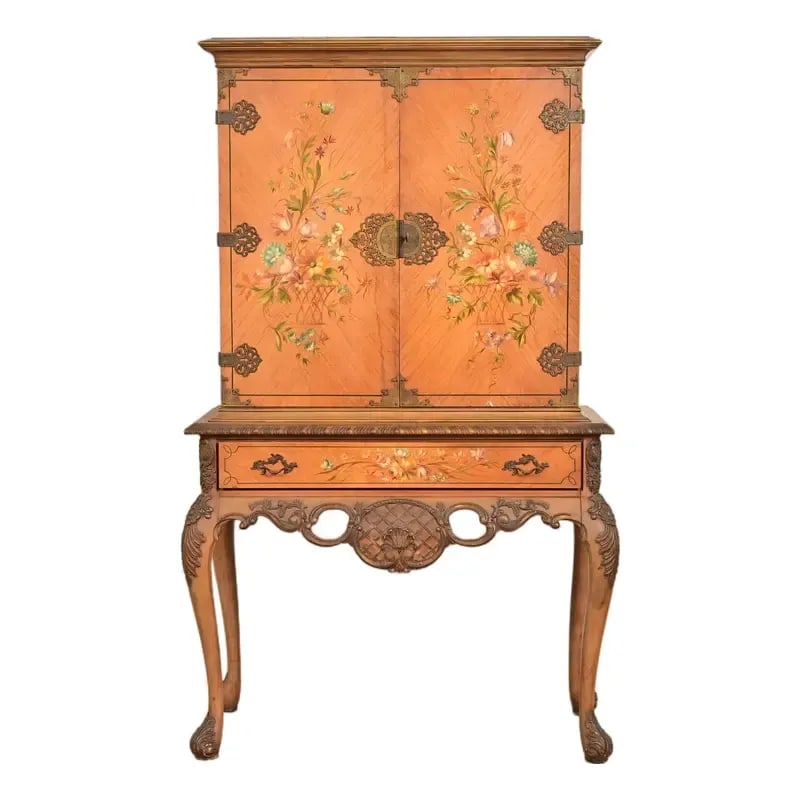 Berkey & Gay Style Antique Georgian Carved Satinwood Hand Painted Bookcase or Bar Cabinet: A gorgeous antique Georgian or Chippendale style bookcase, dining cabinet, or bar cabinet In the manner of Berkey & Gay USA, Circa 1920s Carved satinwood, with hand painted flowers, walnut interior, a