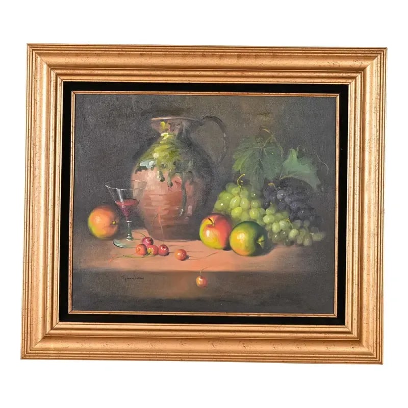 Original Signed Frank Lean French Still Life Oil Painting on Canvas in Carved Giltwood Frame: A beautiful still life oil painting depicting a pitcher, a glass of red wine, and various fruits, including grapes and apples, on a table in carved giltwood frame Signed by artist: Frank Lean France, 