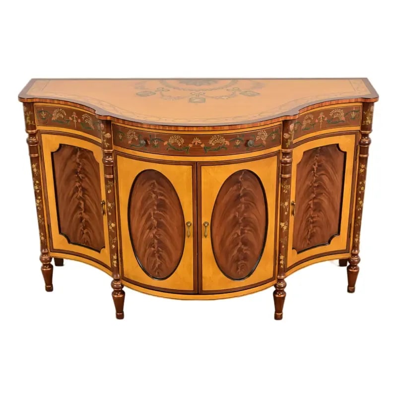 Late 20th Century French Regency Louis XVI Inlaid Flame Mahogany Hand Painted Sideboard: A gorgeous French Regency Louis XVI style sideboard, console, or bar cabinet By Chelsea House Circa Late 20th Century Inlaid flame mahogany and satinwood, with hand painted and gold gilt details, and 