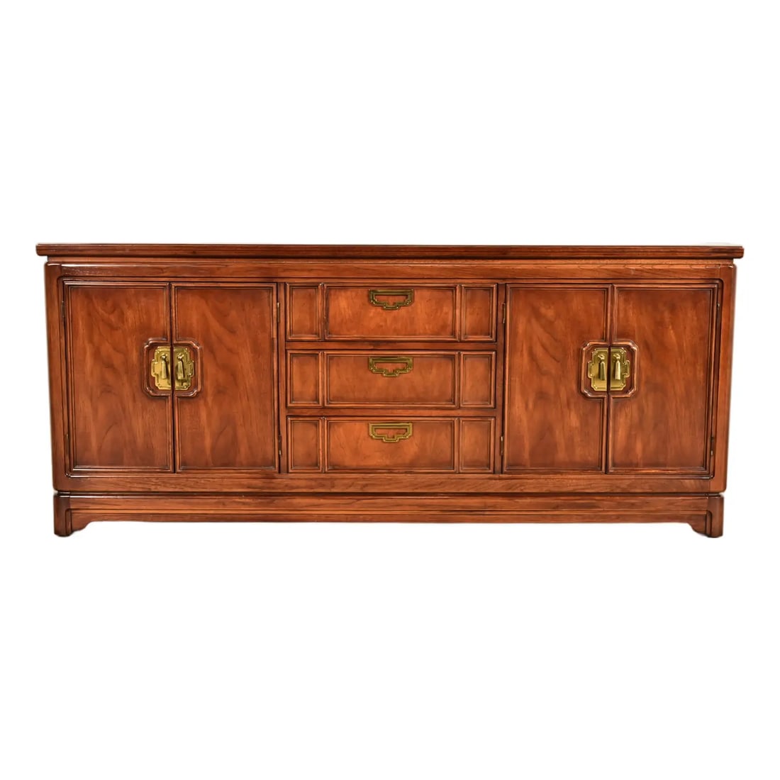 Thomasville Mid-Century Hollywood Regency Chinoiserie Walnut Long Dresser or Credenza, Circa 1970s: A gorgeous mid-century modern Hollywood Regency Chinoiserie long dresser or credenza By Thomasville USA, Circa 1970s Carved walnut, with original Asian-inspired brass hardware. Measures: 72"W x 19.25"