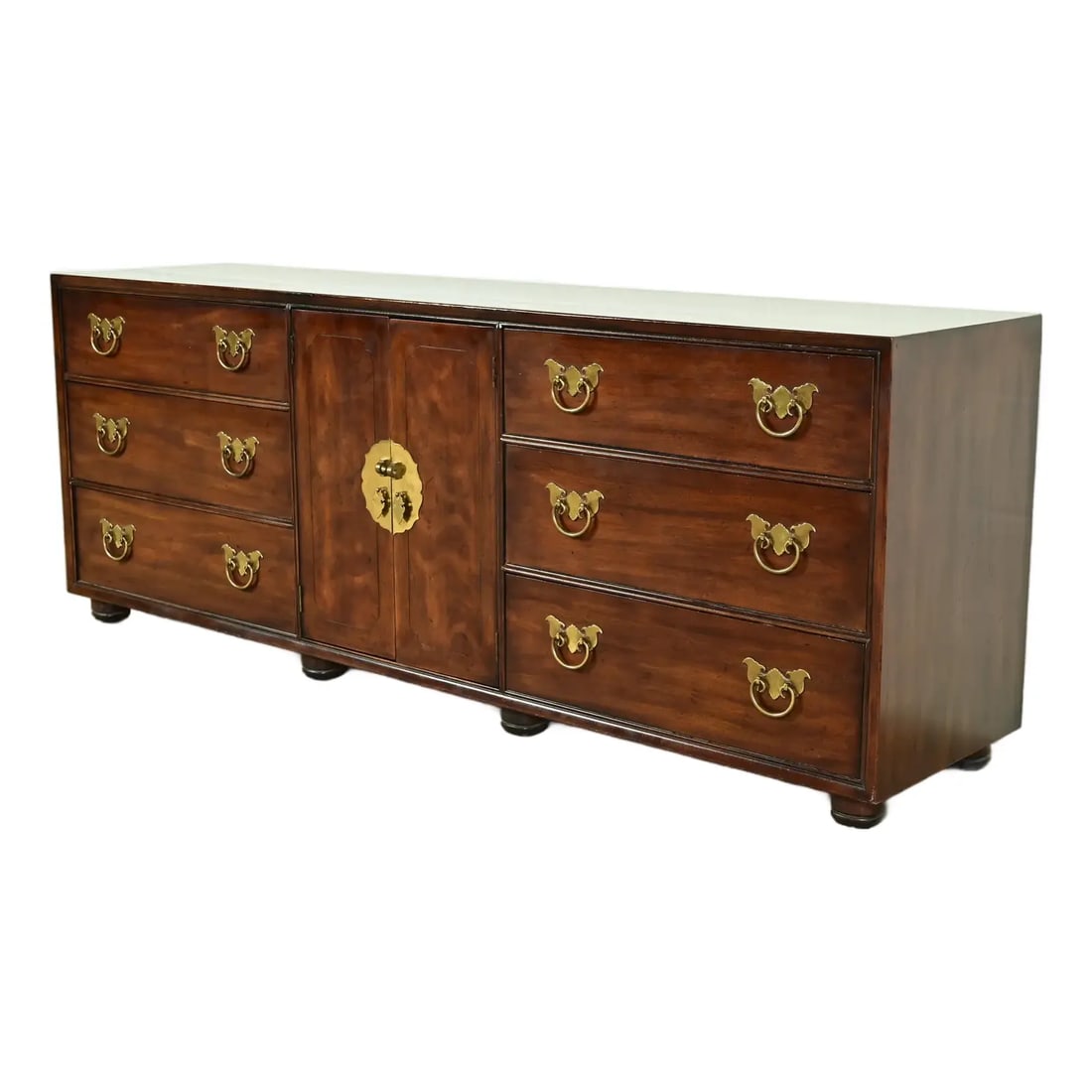Henredon Mid-Century Hollywood Regency Chinoiserie Mahogany Dresser or Credenza, Circa 1970s: An exceptional Mid-Century Modern Hollywood Regency Chinoiserie triple dresser or credenza By Henredon USA, Circa 1970s Walnut, with original Asian-inspired brass hardware. Measures: 80"W x 20"D x 30"