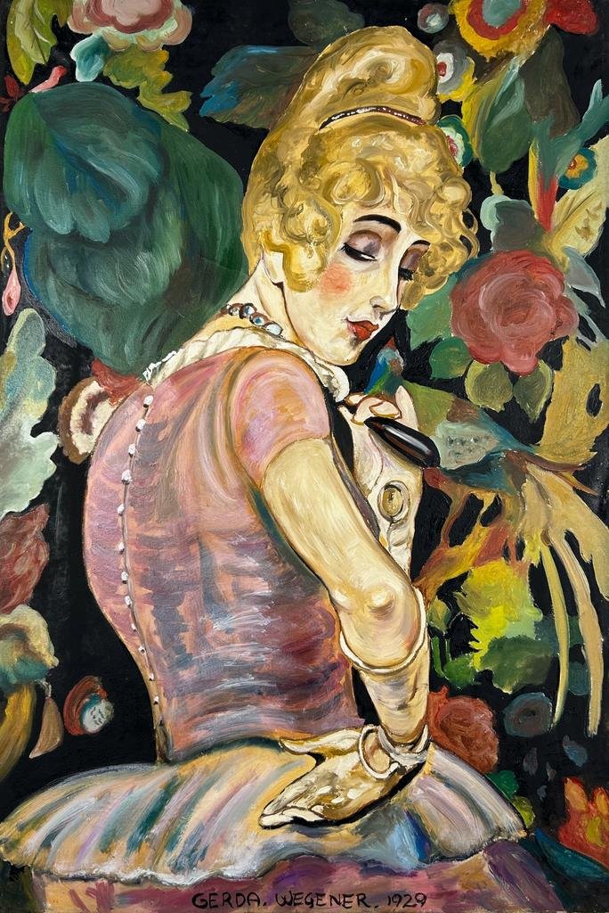 Gerda Wegener (Oil on Canvas Painting) in the style of: Rendered in the style of Gerda Wegener. Technique: Oil on Canvas Painting. Measures: 15 ½ x 23 ½ Inches. Provenance: Private collection. "In the style of" means after the artist. Wegener