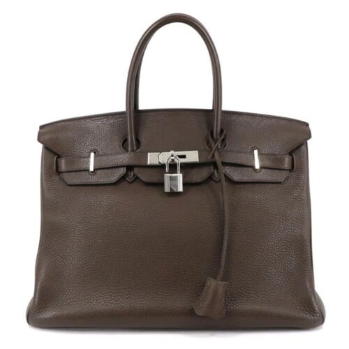 HERMES Birkin 35 Taurillon Clemence Chocolat Silver Hardware Women's Handbag: Condition: Pre-ownedBrand / manufacturer : HERMES Product name : HERMES Birkin 35 Taurillon Clemence Chocolat Silver Hardware Women's HandbagPart no : N/AMaterial : Taurillon ClemenceProduct rank : Se