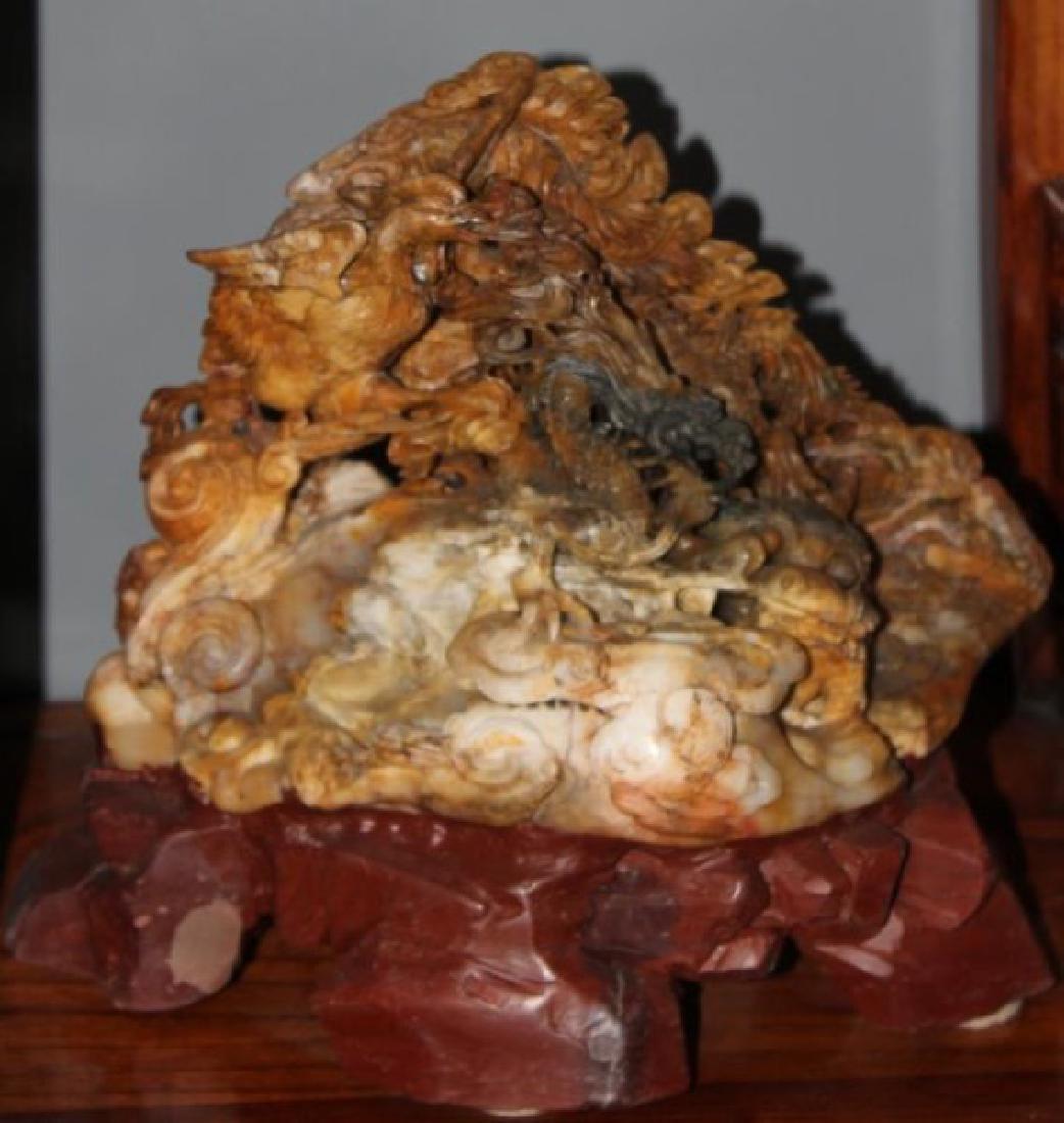 Chinese carved soapstone figural group of dragon and (1 of 2)