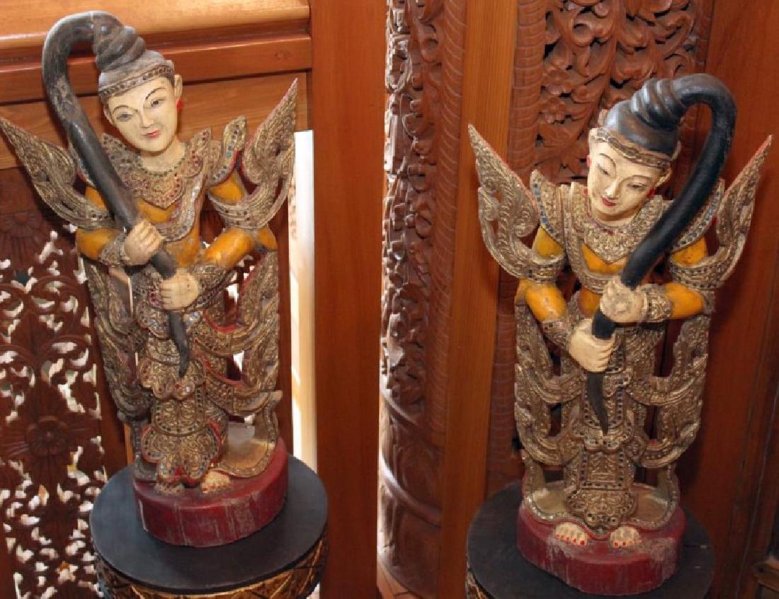 Pair of Burmese painted wood figures of female (1 of 3)