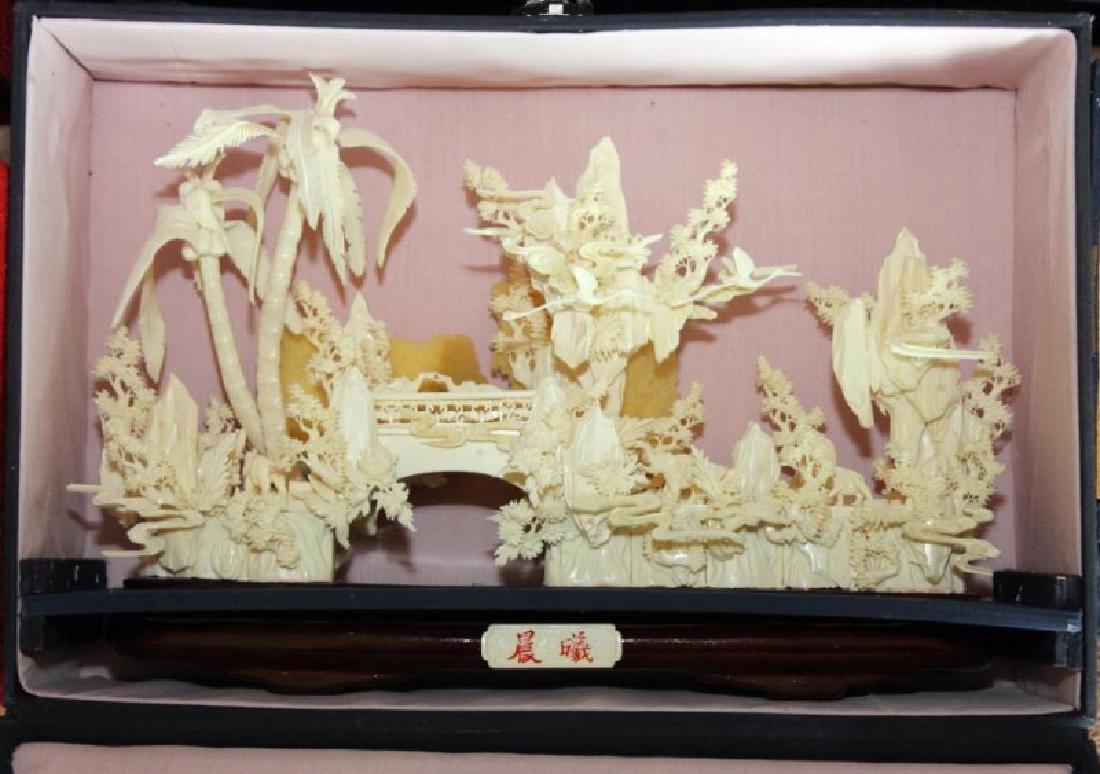 Two Chinese carved and veneered bone landscapes, modern;: Two Chinese carved and veneered bone landscapes, modern; length: the longest 16 inches
