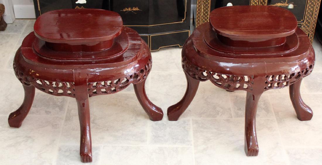 Pair of Asian wood carved oval stands; 22" x 20" (1 of 2)