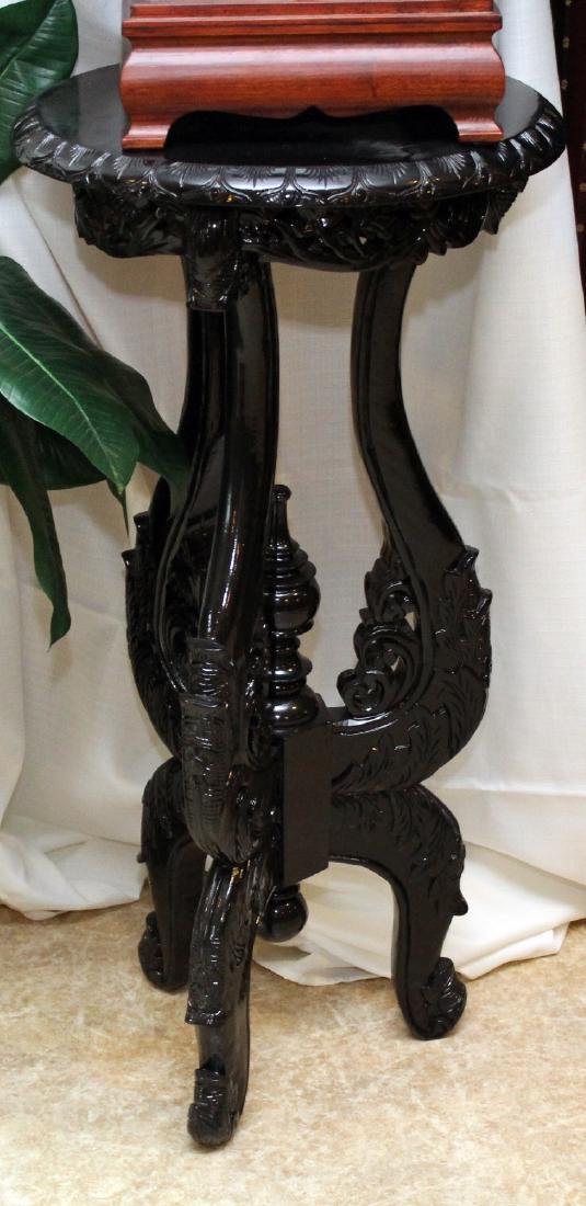 Pair of Asian wood carved tall tables; 17.5" x 36" (1 of 1)