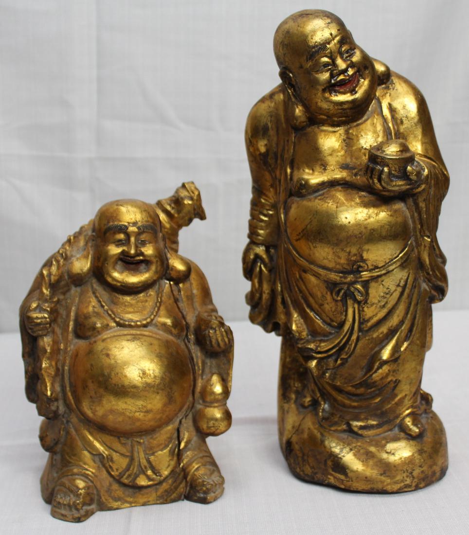 2 Chinese carved wd gilt happy fat men, both showing: 2 Chinese carved wd gilt happy fat men, both showing slight separation; sm is 7" x 10"