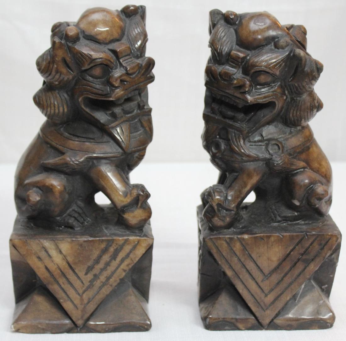 pair carved brown hardstone Temple dogs; 4.75" x 11" (1 of 2)