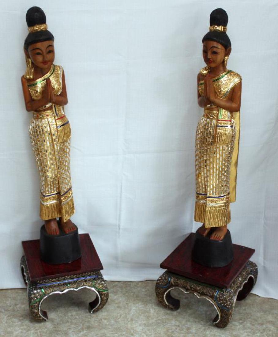 pair of Thai wood carved gilt decorated mirror applied: pair of Thai wood carved gilt decorated mirror applied Sawadee ladies on stands, few small mirrors missing, ladies 6.5" wide x 40" high, stands 12.5" wide x 9.5" high