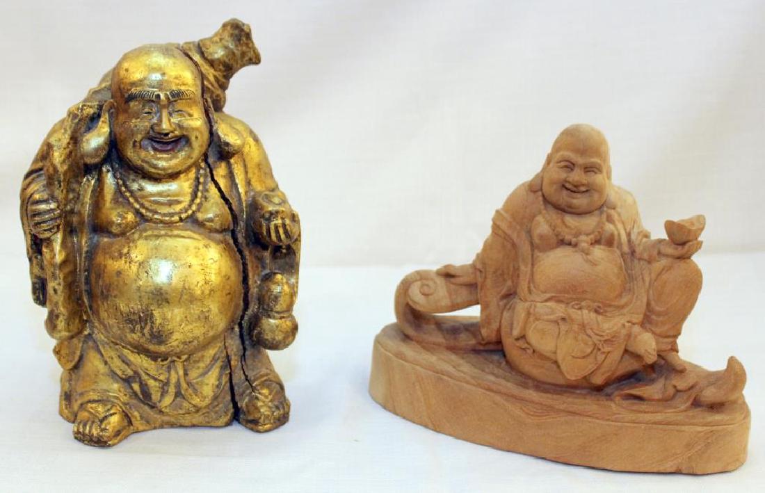 2 Chinese carved happy fat men, 1 gilded, both showing: 2 Chinese carved happy fat men, 1 gilded, both showing light separation, 6.75" wide x 10" high