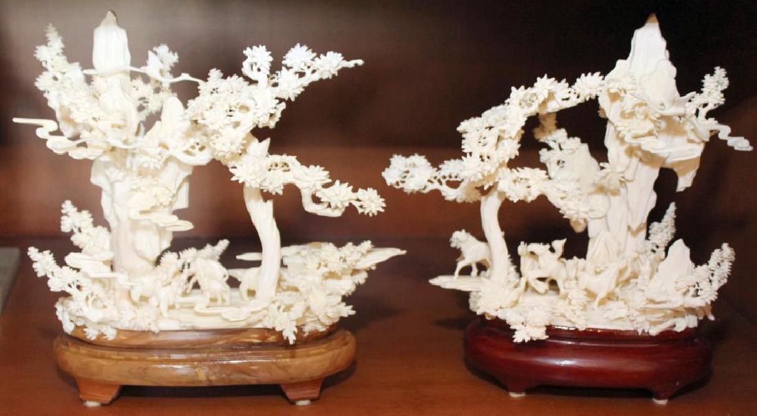 Two Chinese carved and veneered bone landscapes with: Two Chinese carved and veneered bone landscapes with horses and elephants, 20th century. Height 11"; possible small breaks, chips, cracks or losses with possible composition elements