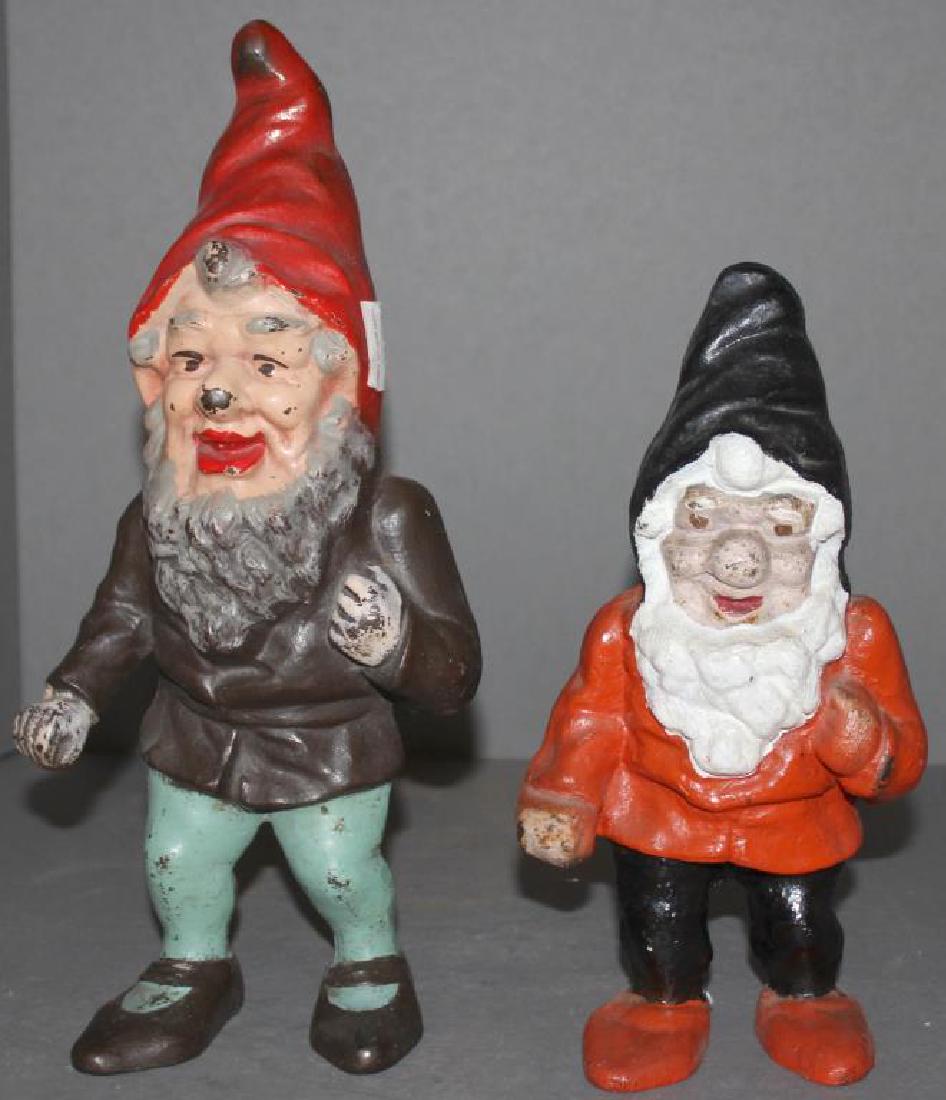 (2) Cast Iron garden gnomes, (1) "Dick Bros Inc, (1 of 7)