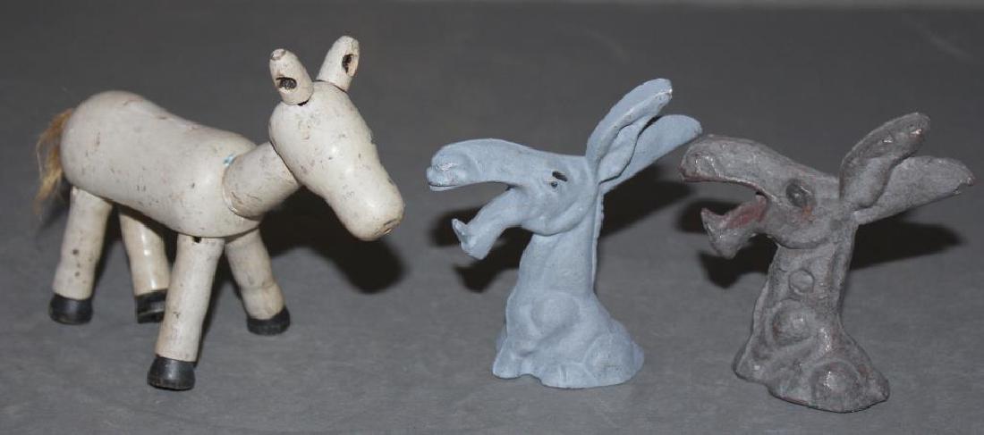 early jointed toy horse, 2 Cast Iron mule bottle cap (1 of 3)