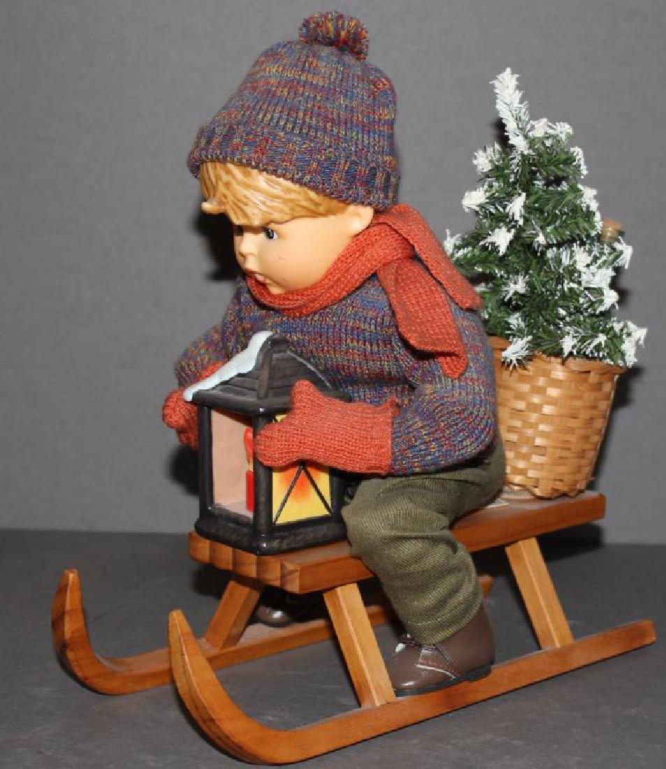 Ride Into Christmas" Hummel style doll on sleigh, 11": Ride Into Christmas" Hummel style doll on sleigh, 11" high x 10.5